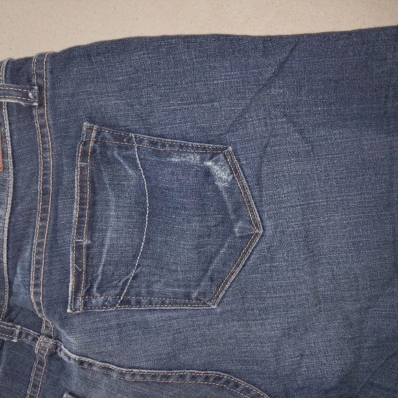 PAIGE Blue Jean Shorts with Distressed Hem - Picture 10 of 13